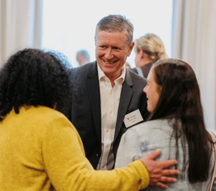 a man and a woman smiling