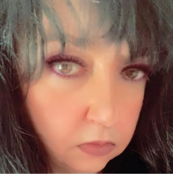 a woman with brown eyes